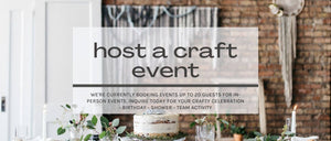image- host a craft event - inquire today for crafty celebrations - birthday, shower, team-building. image- brick wall with white door and hanging yarn, white cake, eucalyptus, and candle sticks